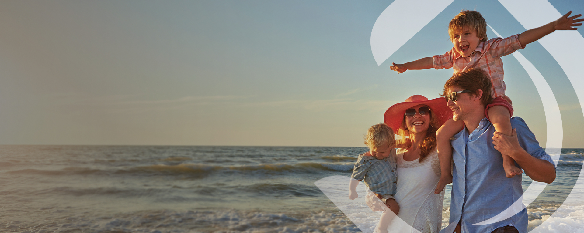 A family of four at the beach